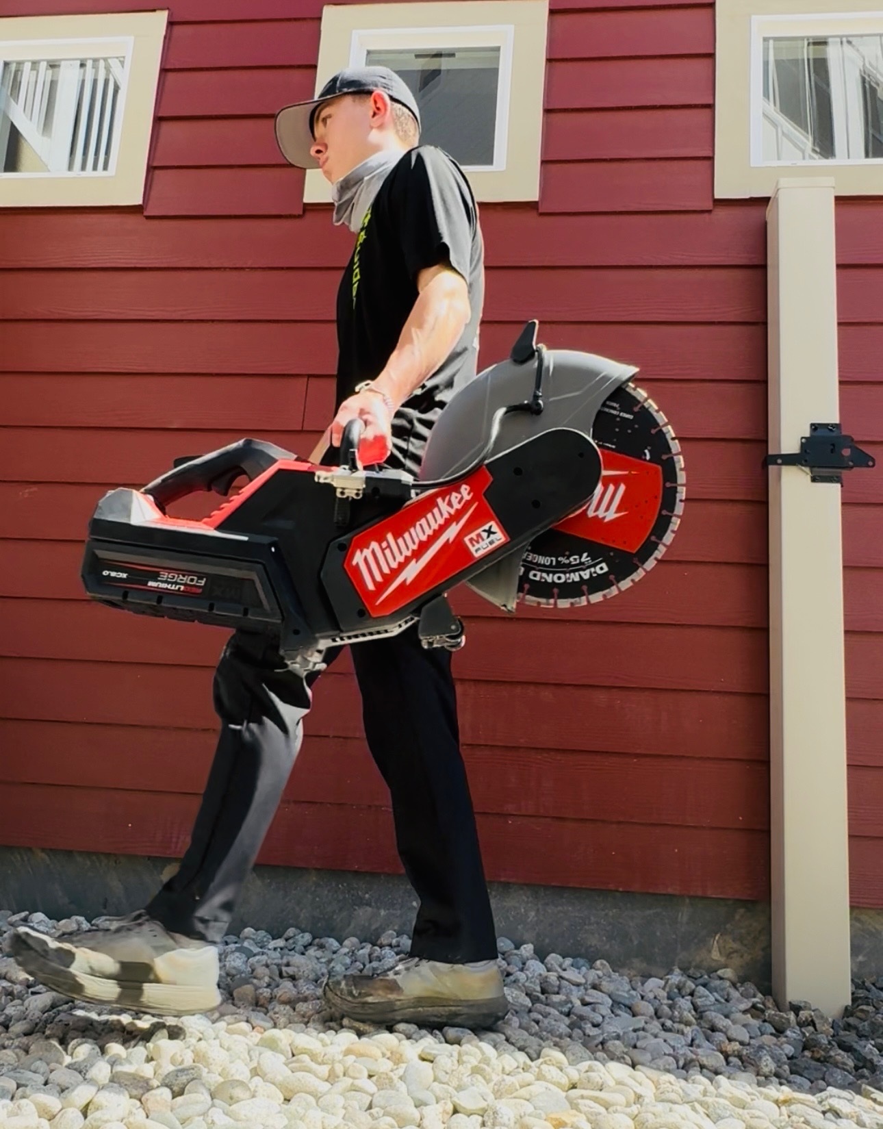 M4 Landscaping team member with equipment